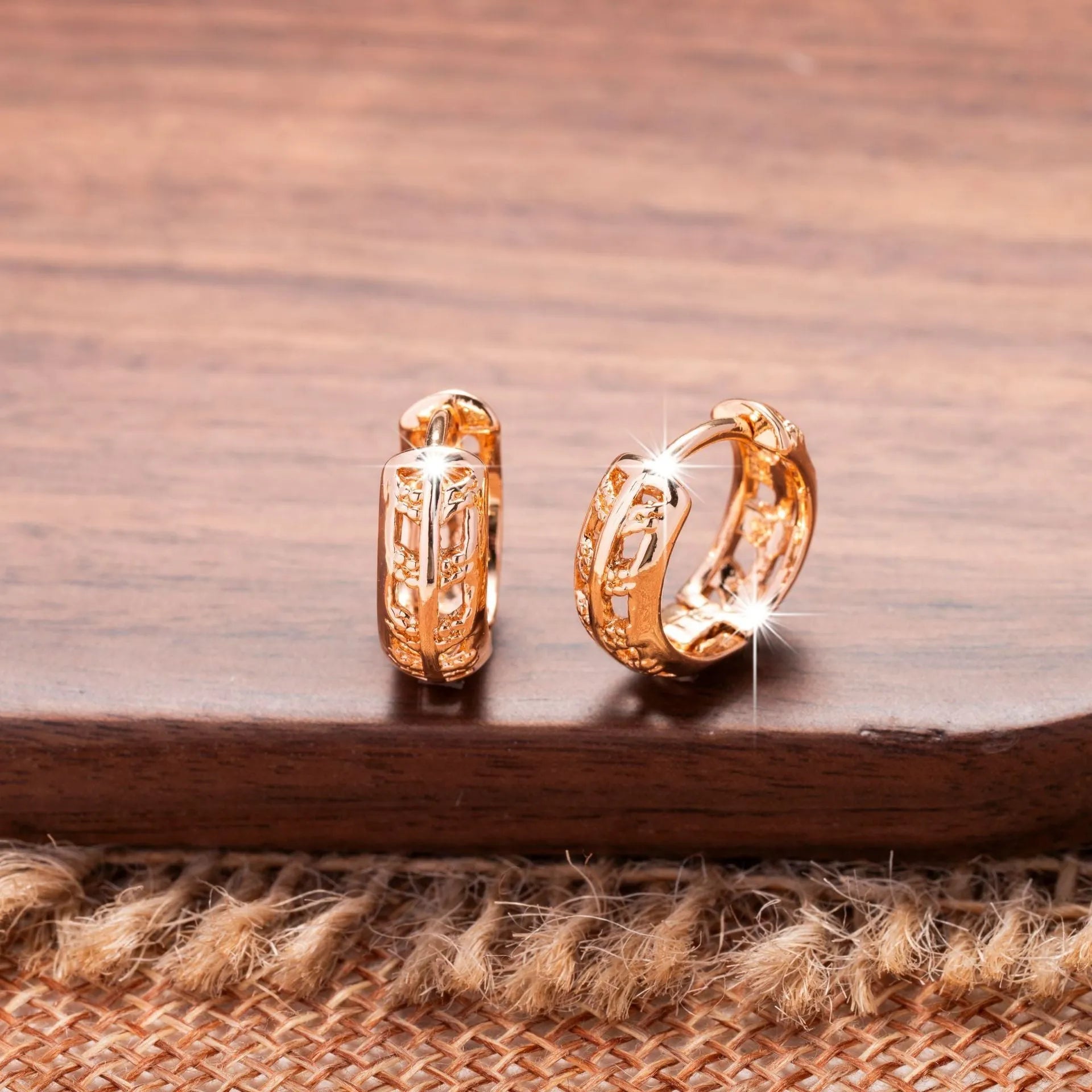 Copper hollowed-out earrings with heart and leaf shapes in rose gold finish