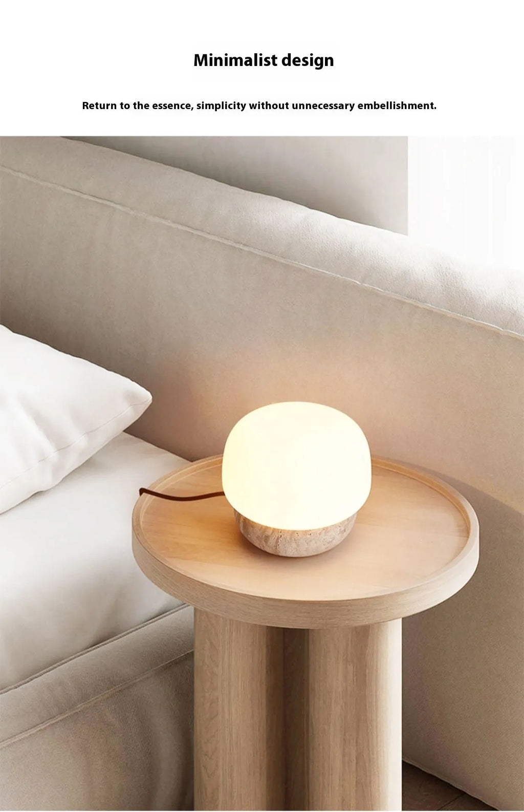 Cream coloured retro ceramic bedside lamp with a globe fabric shade and button switch.