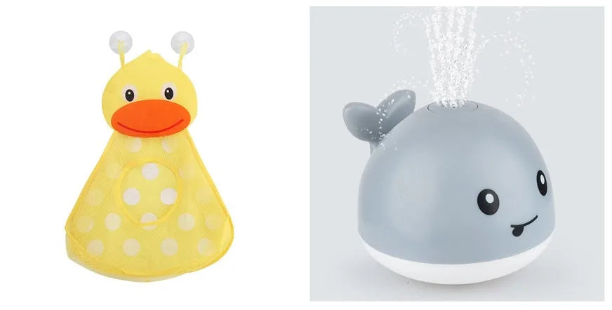 Whale-shaped electric bath toy spraying water with coloured LED lights, shown with base unit on blue background