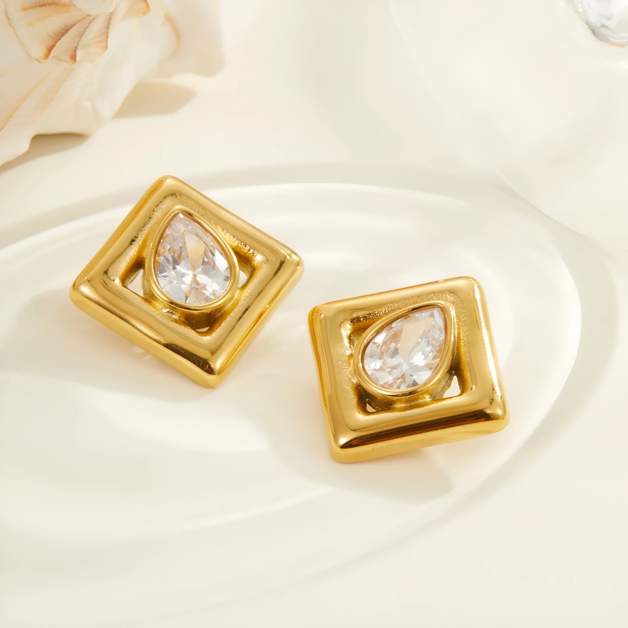 Gold geometric stud earrings with water drop zircon inlays on stainless steel with 18K electroplated finish
