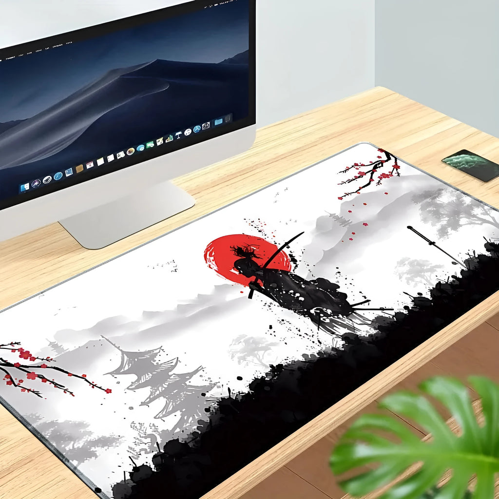 Japanese Samurai design gaming mouse pad on a desk, showing non-slip rubber base and cloth surface.