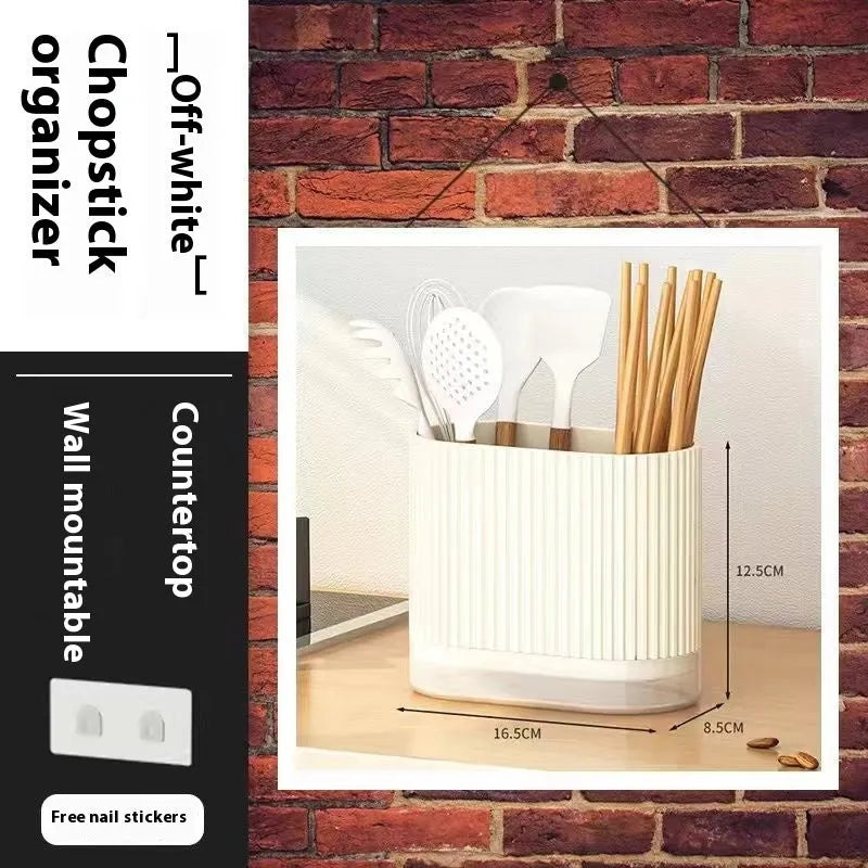 A beige plastic wall-mounted chopsticks holder with a cross-border drain design for kitchen utensil storage.