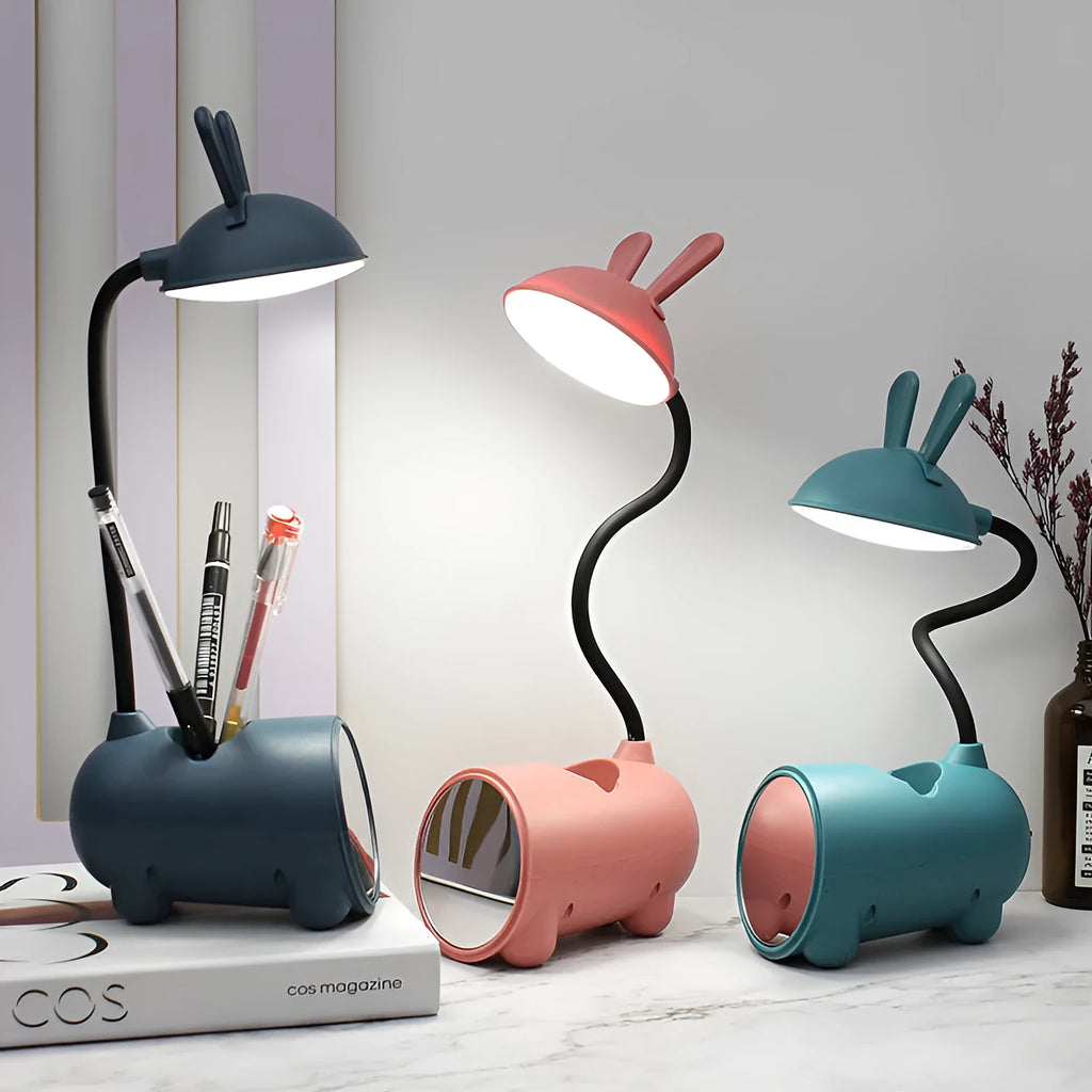 Simple cartoon-style USB desk lamp with pen holder base in green, dark blue, or pink