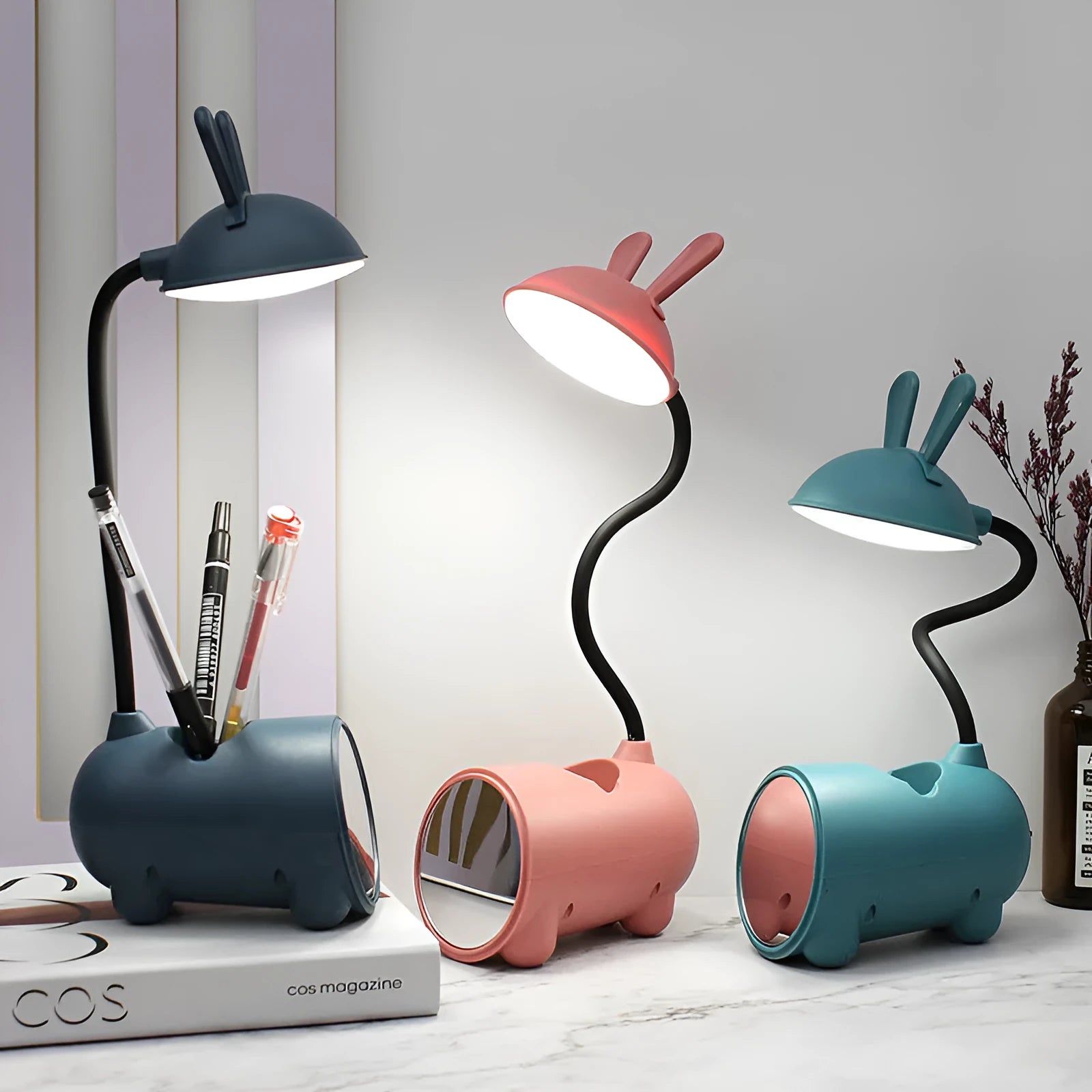 Simple cartoon-style USB desk lamp with pen holder base in green, dark blue, or pink
