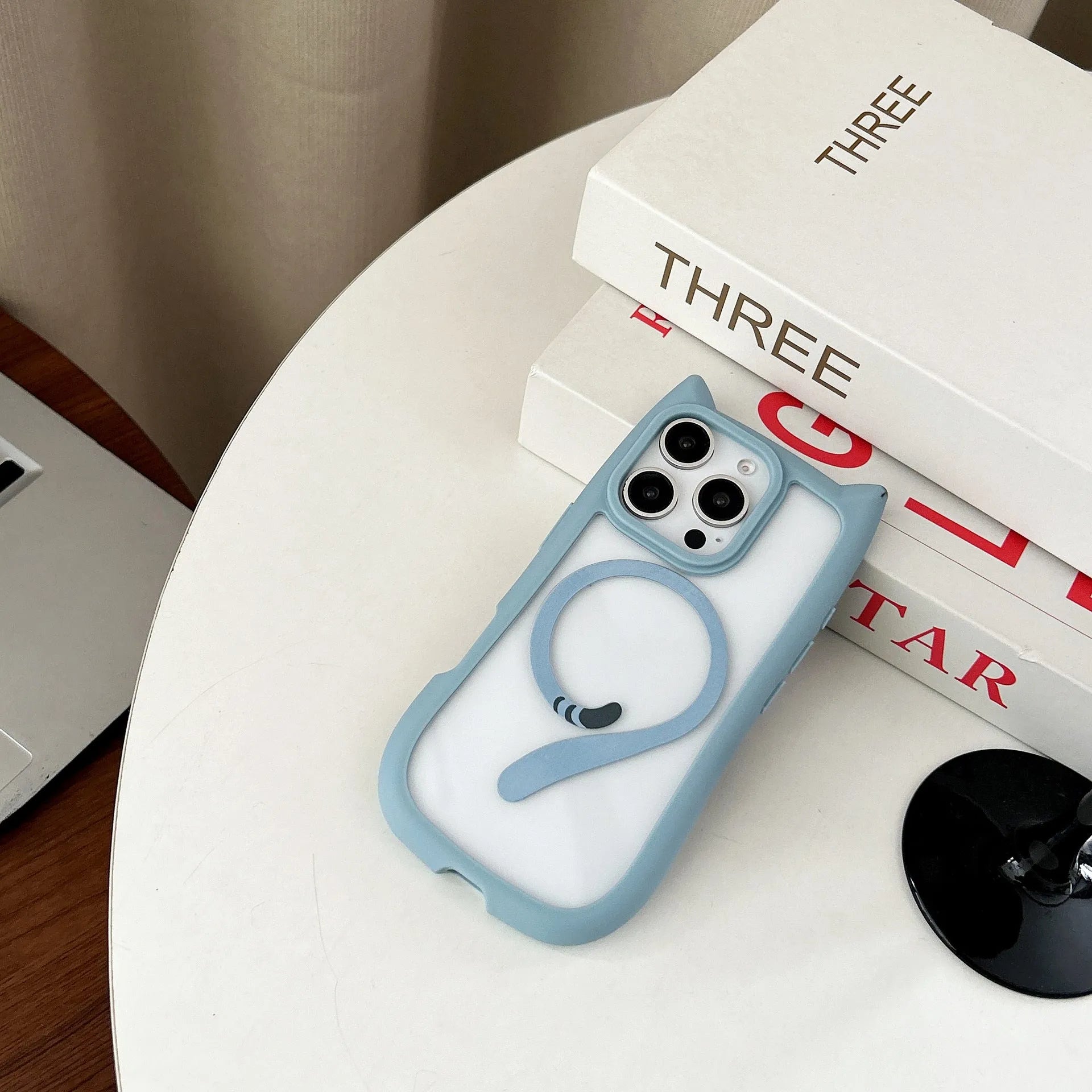Transparent acrylic and TPU two-in-one phone case for iPhone 17 series in black, shown with magnetic function