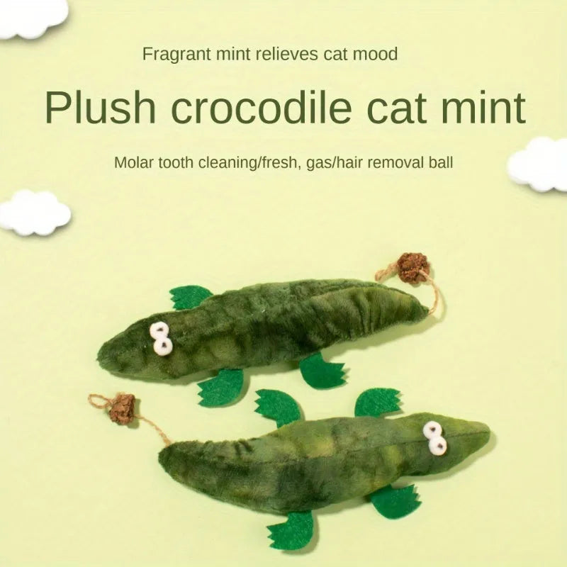 Green plush alligator catnip toy with peppermint scent for oral cleansing and stress relief