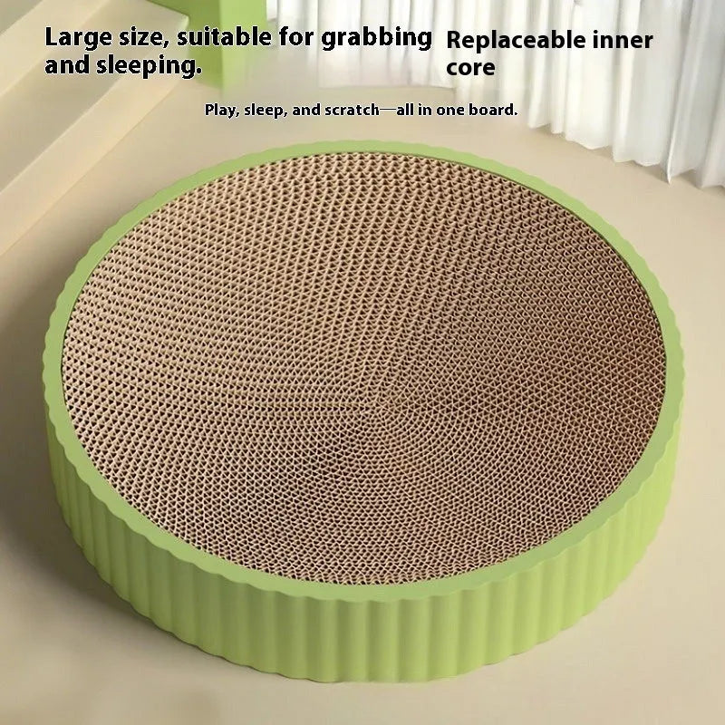 Green and white round cat scratching board measuring 55cm with replaceable corrugated cardboard scratching surfaces