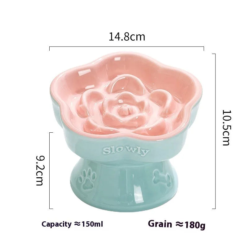 Black ceramic pet bowl with raised design and anti-tumble base for cats and dogs