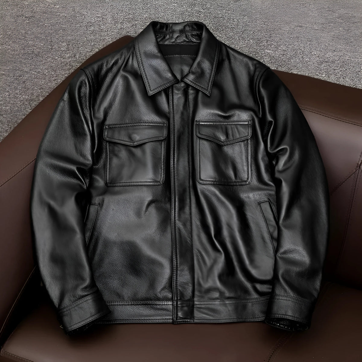 Men's black lapel leather jacket with side pockets shown on plus-size model