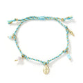 Women's adjustable woven bracelet made from colourful braided rope with a strap tag.