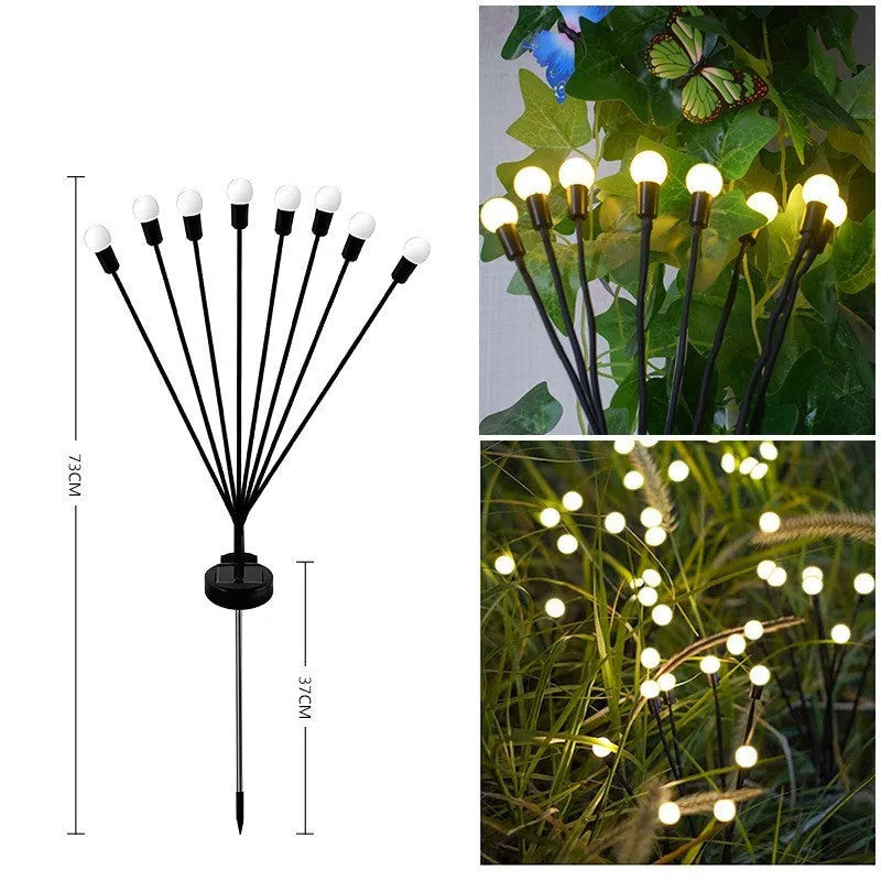 Solar-powered LED garden light with multiple heads on a metal spike in grass.