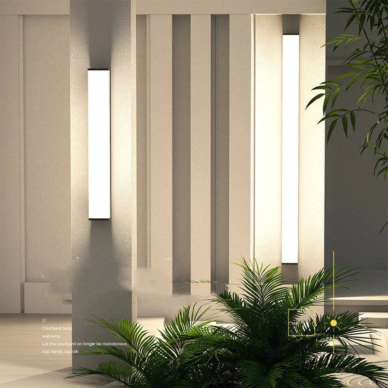 Outdoor waterproof wall light with long strip design, stainless steel and PC construction, 60cm height