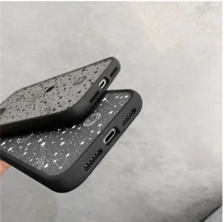 Star Universe mobile phone case for iPhone models showing smooth tactile finish in black and white colour options