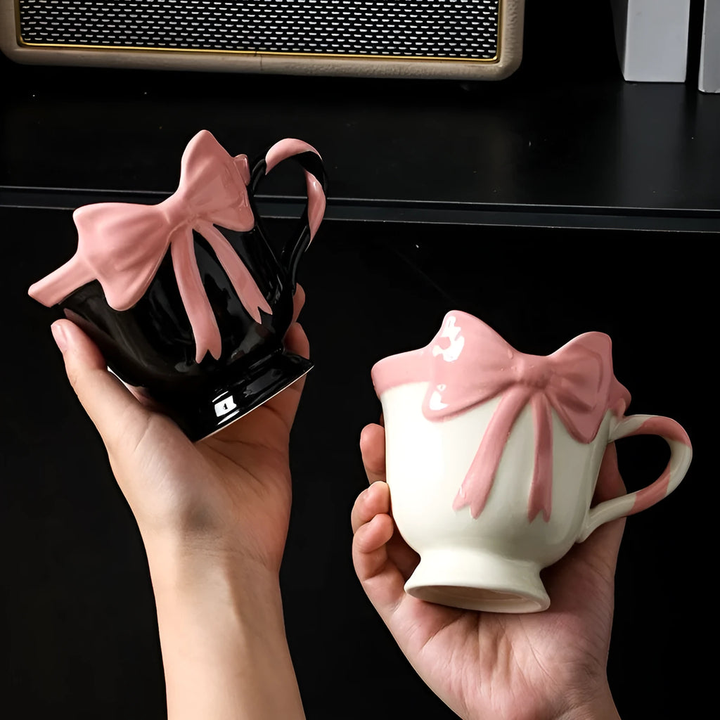 Ceramic heart bow design mug in white powder or black pink colour with 301-400ml capacity