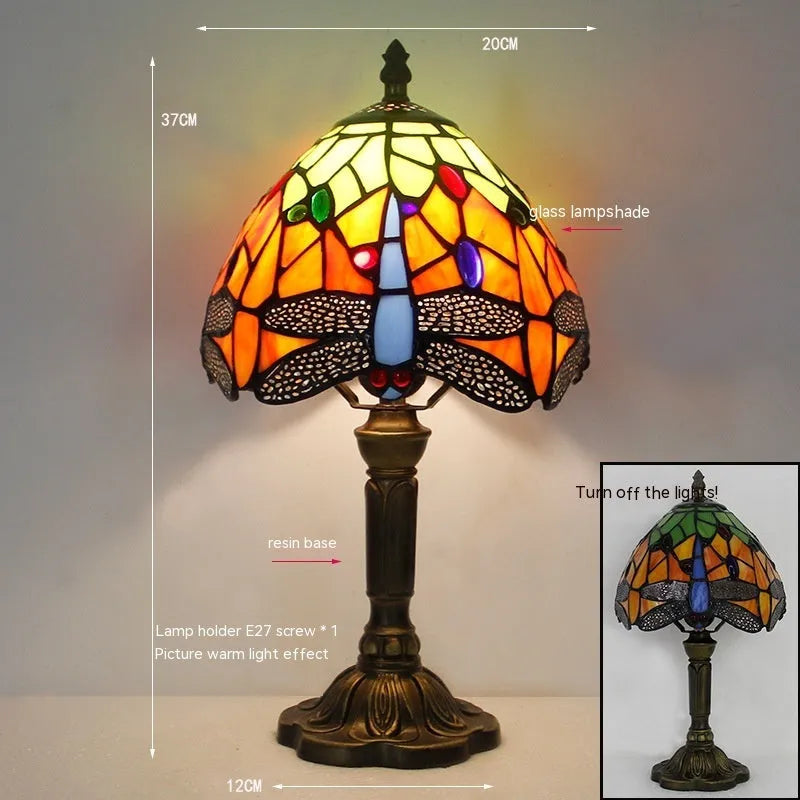 Stone table lamp with Tiffany-style blue dragonfly design on base
