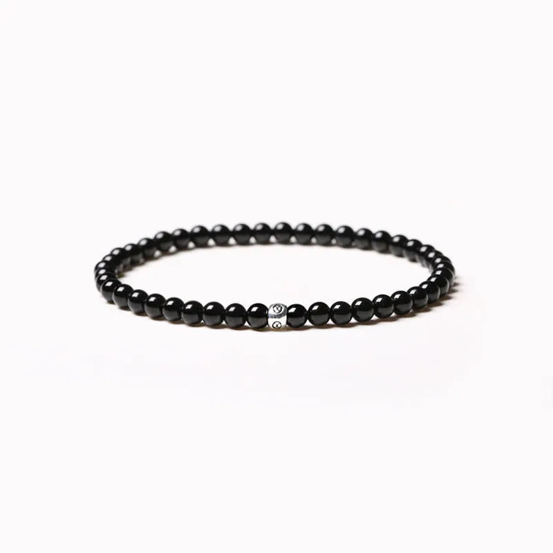 Geometric cut surface agate bracelet with obsidian, blue San and black agate 4mm beads