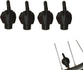 Four latex tyre valve caps, two black and two skin tone, on a grey background