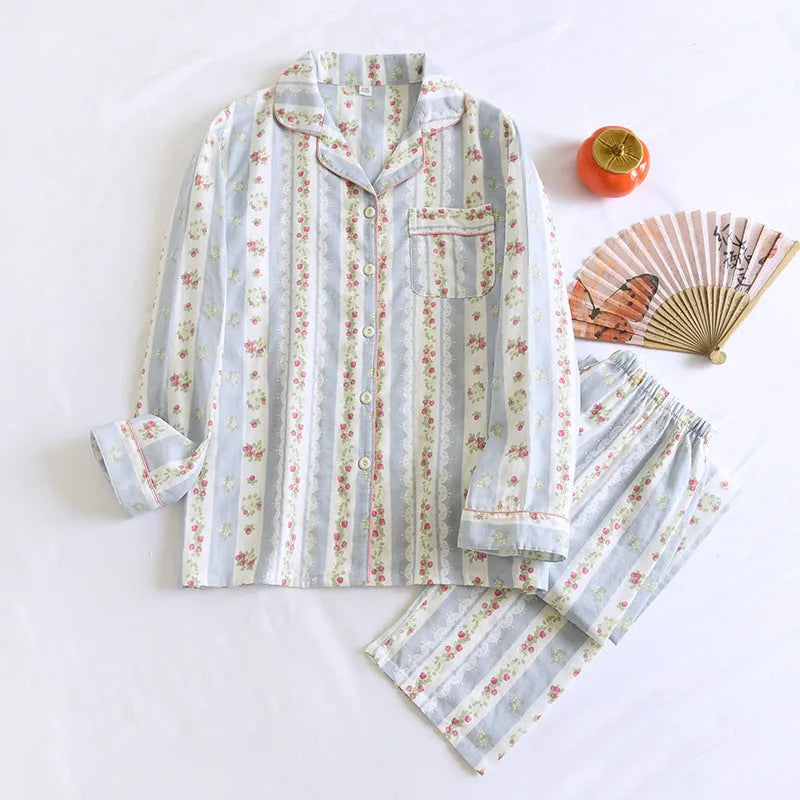 Women's red small fruit patterned cotton gauze long sleeve pyjama top and trousers set.