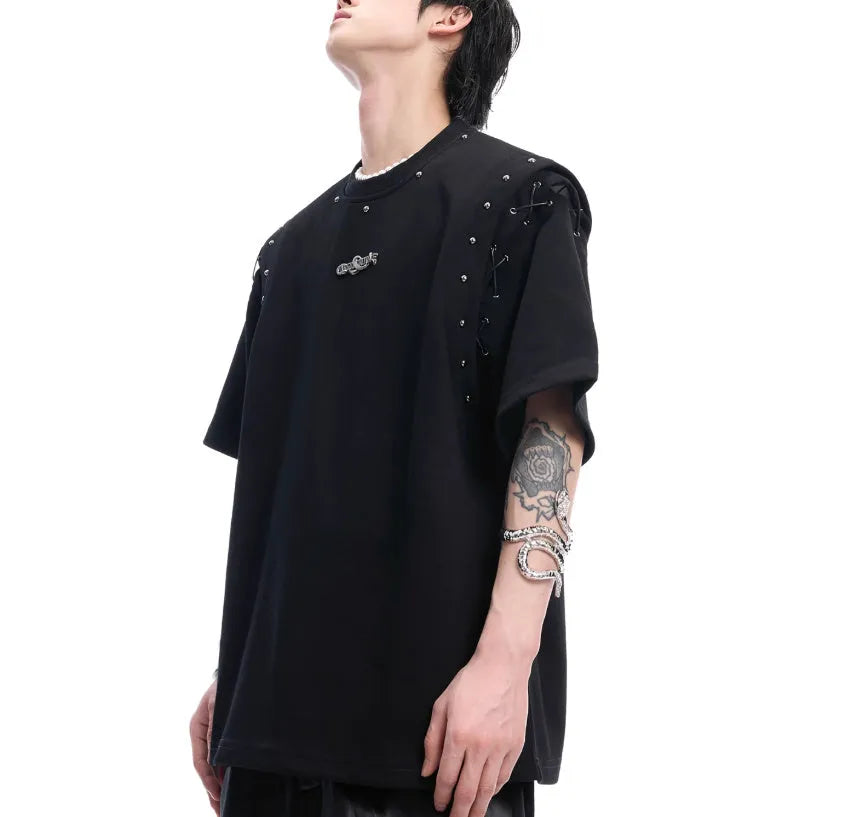 Women's black short sleeve top with a white lace-up cutout detail on the side.