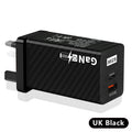 White Gallium Nitride 65W USB-C laptop charger with EU plug showing compact size