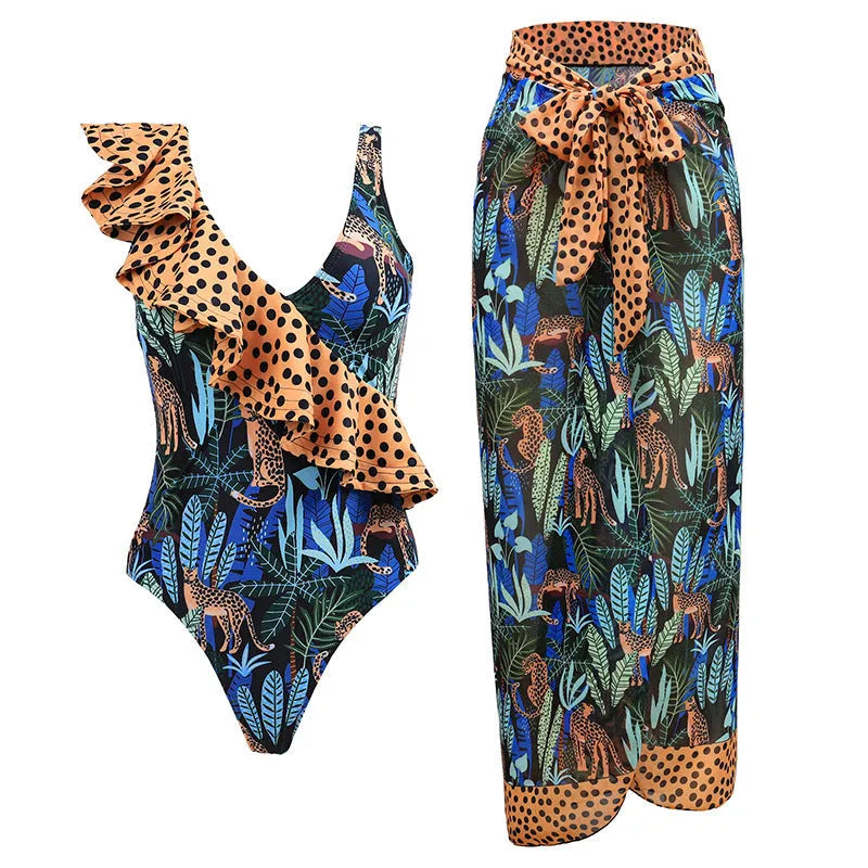 Women's solid colour one-piece swimsuit with thin spaghetti straps and a matching removable skirt.