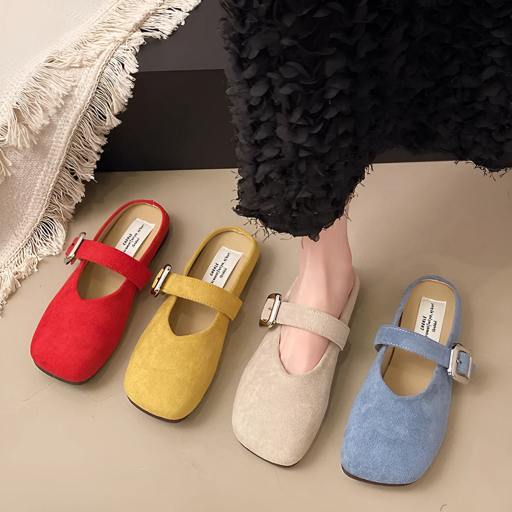 Women's flat closed-toe slippers in apricot with square toe, PU upper, and rubber sole.