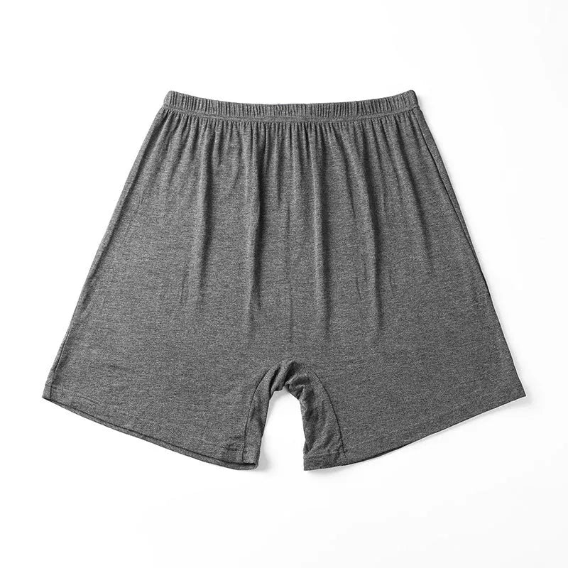 Men's solid colour high-waist boxer shorts in modal fabric, shown in black, on a plain background.