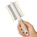 White double-sided dog and cat brush showing grooming comb and deshedding brush sides on a 230mm handle.