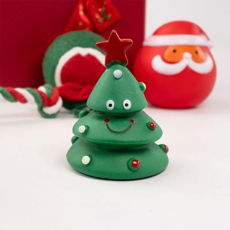 Christmas dog chew toys vinyl gift sets with festive designs including trees, Santa heads, tennis balls and bite ropes