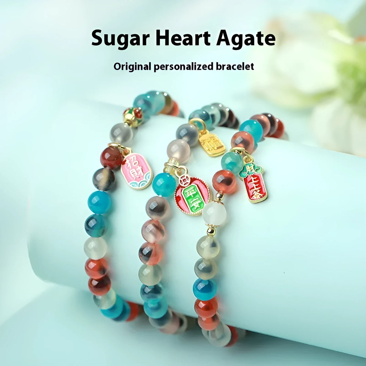 Women's agate snake bracelet with copper coin detailing and coloured glaze accents in geometric design