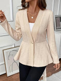 Women's apricot jacquard knit cardigan with one button front, shown on a model.