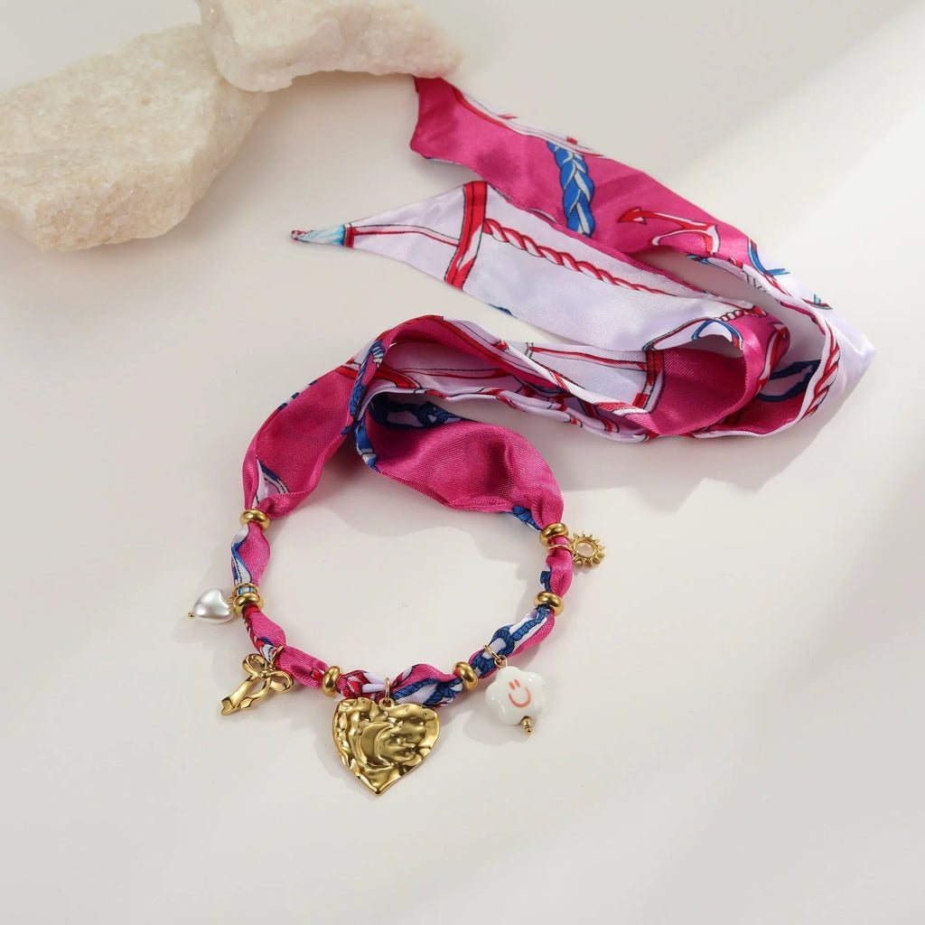Stainless steel 18K electroplated jewellery set with geometric pendant necklace and matching bracelet