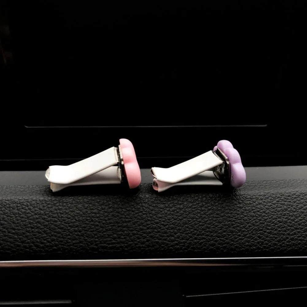 Resin car fragrance clip with Baiyun cartoon cloud design mounted on car air vent