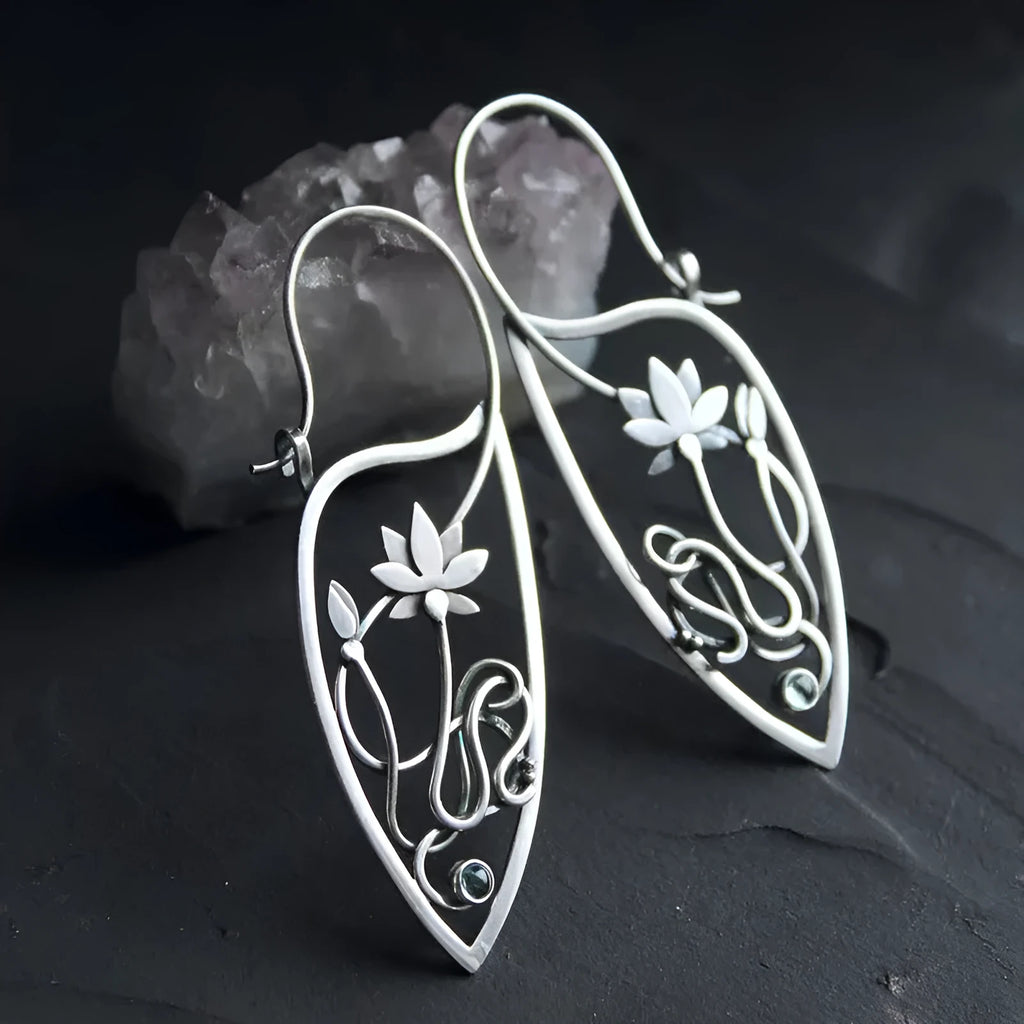 Silver lotus flower earrings with rhinestones on geometric alloy setting