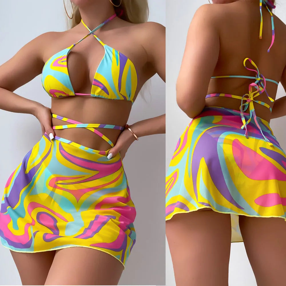 Yellow striped halter neck swimsuit set with lace-up front, skirt, and shorts for women