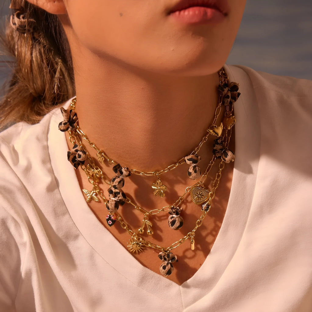 Gold-coloured stainless steel necklace with leopard pattern pendant on adjustable 41-50cm chain