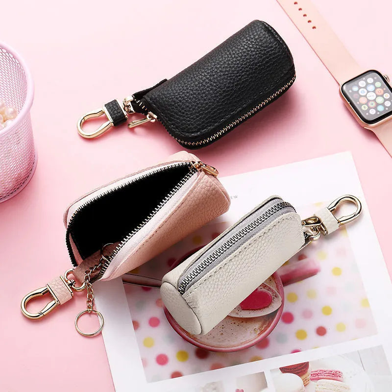 Black PU zip key case for men and women, shown closed with a key ring attached.