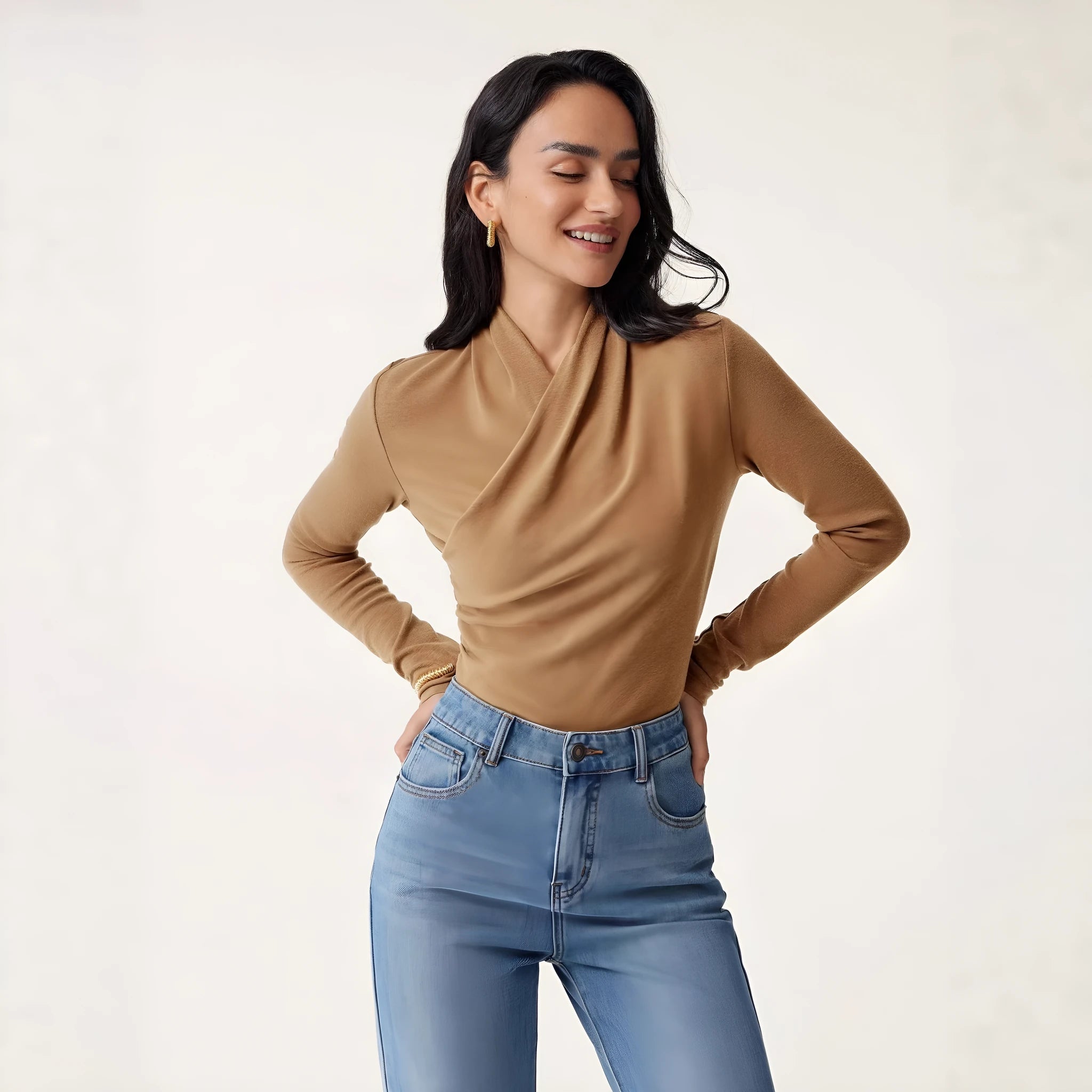 Camel coloured slim fit women's pullover sweater with long sleeves on hanger