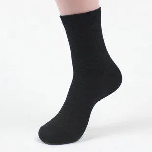 Men's black bamboo fibre socks with small square pattern on ankle