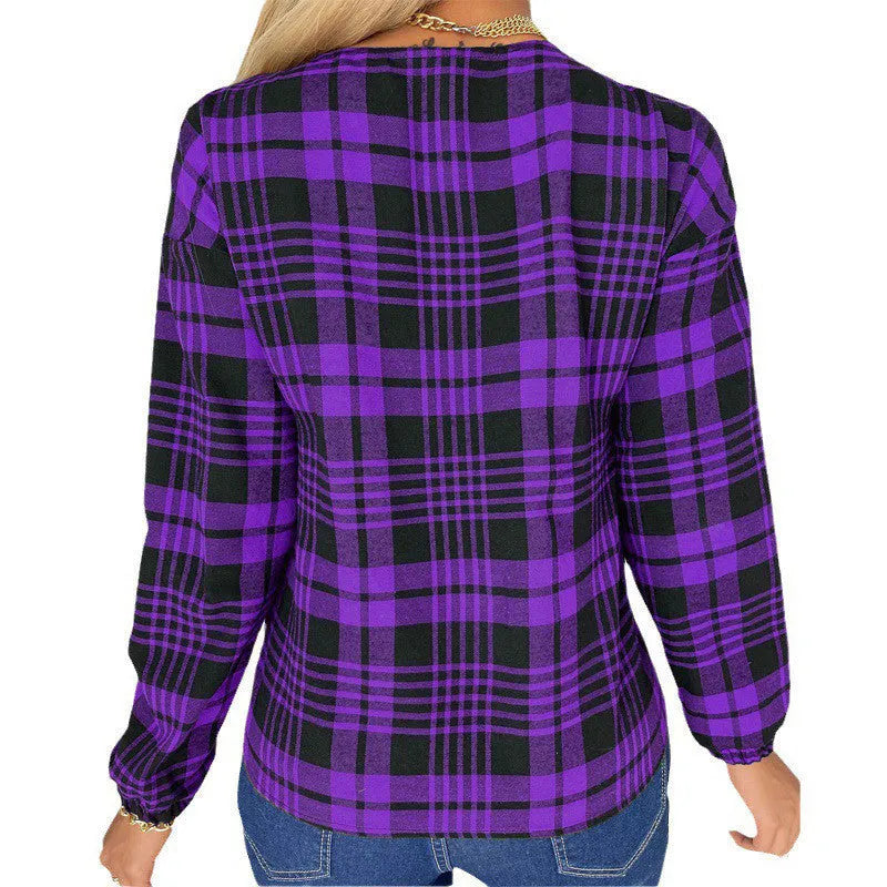 Women's purple plaid loose-fit casual shirt with regular sleeves on a hanger