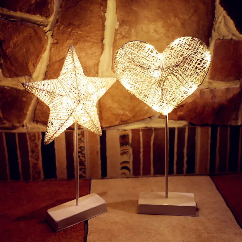 Rattan woven LED decorative table lamp in star, heart, or moon shape with copper wire frame and battery operation