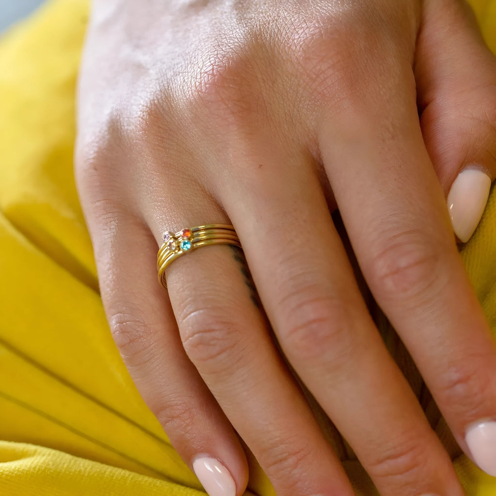 Titanium steel engraved ring with December birthstone colour and geometric shape.