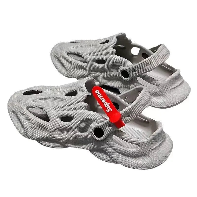 Men's grey EVA coconut slippers with closed toe and perforated holes for beach use