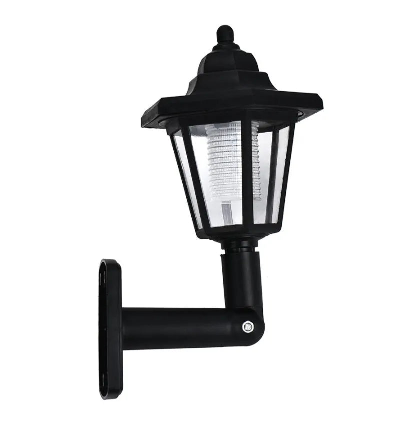 Black hexagonal solar-powered LED wall light for outdoor garden and security lighting
