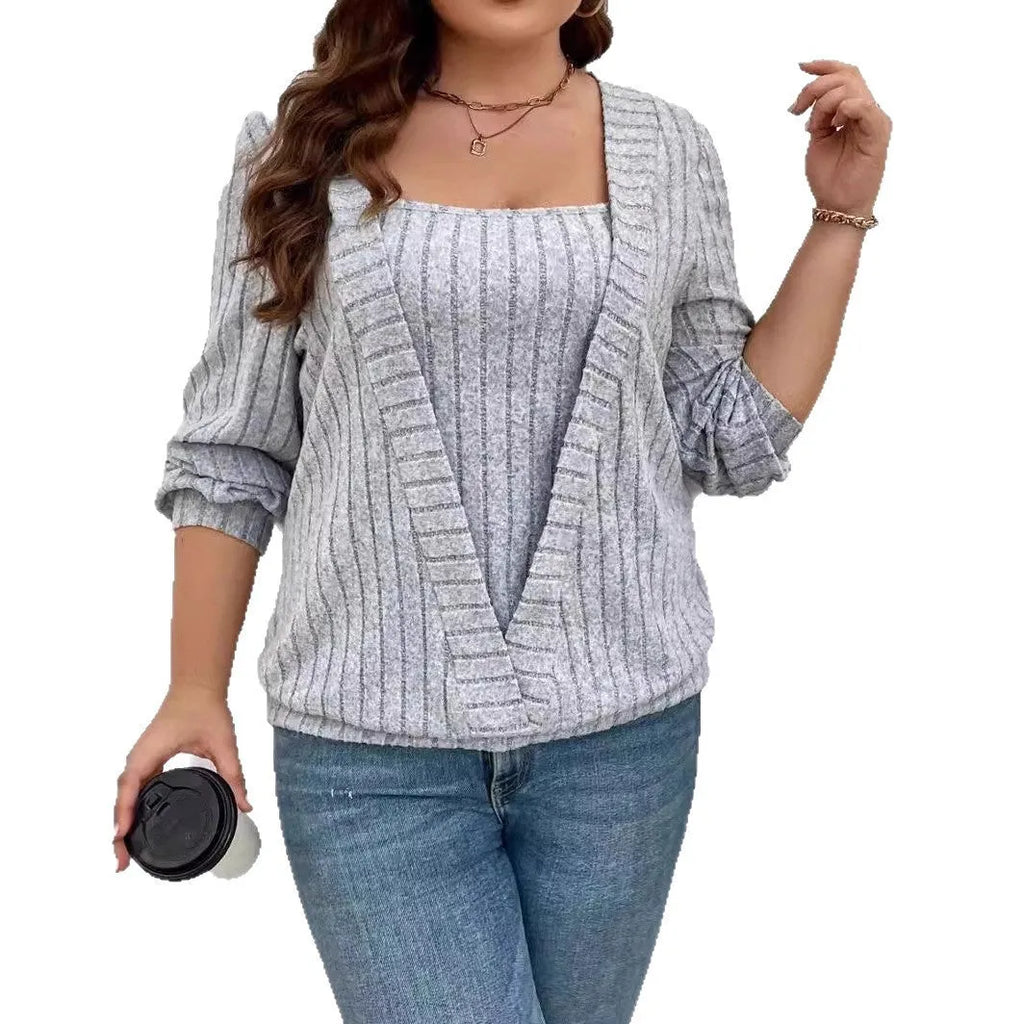 Women's solid colour false two-piece suit top with long sleeves and V-neck in rib fabric.