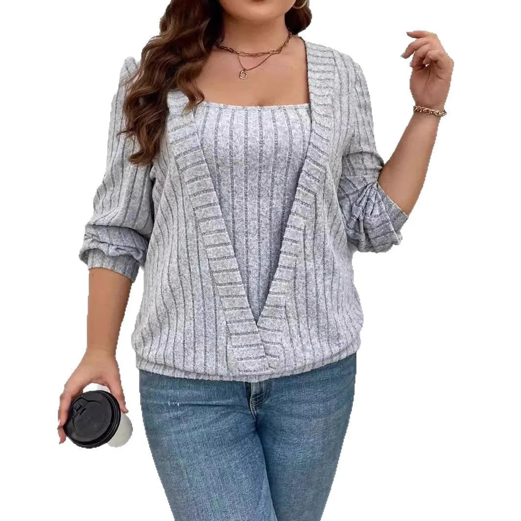 Women's solid colour false two-piece suit top with long sleeves and V-neck in rib fabric.