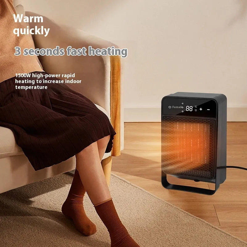 Black desktop electric warm air blower heater with digital touch screen display and remote control on a wooden desk.
