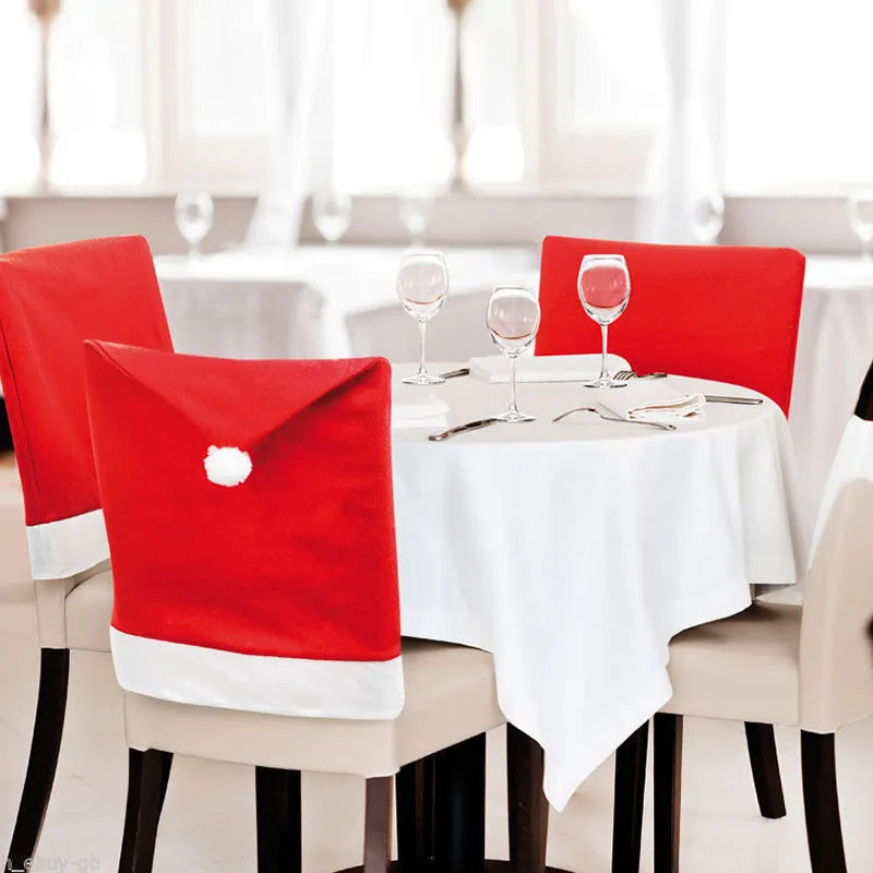 Set of red and white Christmas dining chair covers featuring Santa Claus, Snowman, and Santa hat designs.