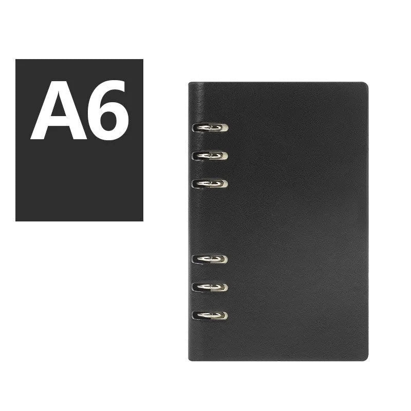 Loose-leaf business notebook in seaweed green imitation leather cover showing A5 size with beige paper