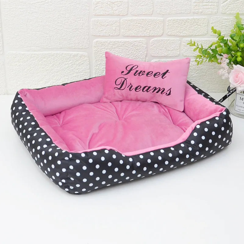 Polka dot printed square dog bed with raised edges and a matching embroidered pillow in grey, for small dogs.